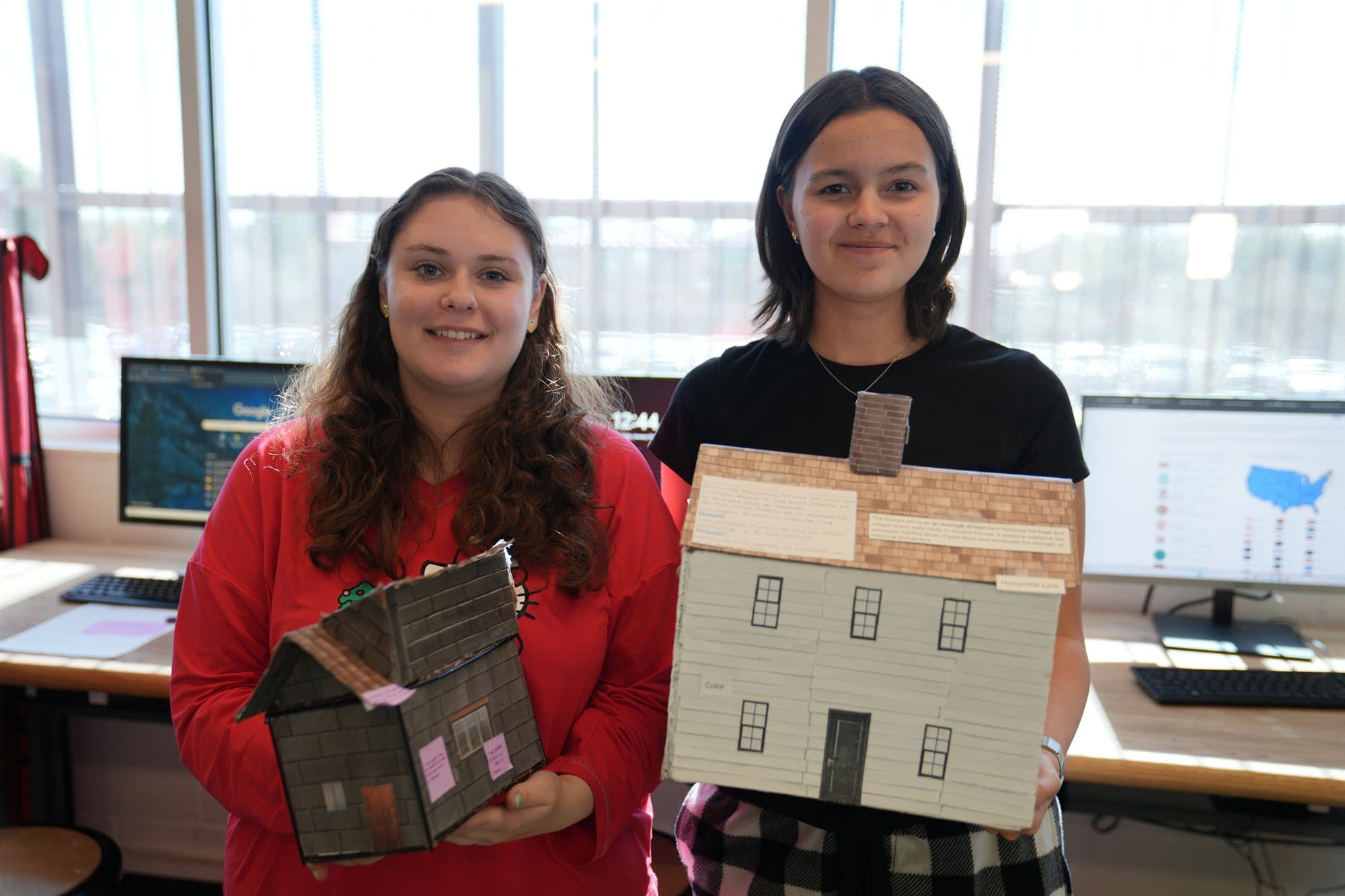 Highland Prep students with a scale-model building