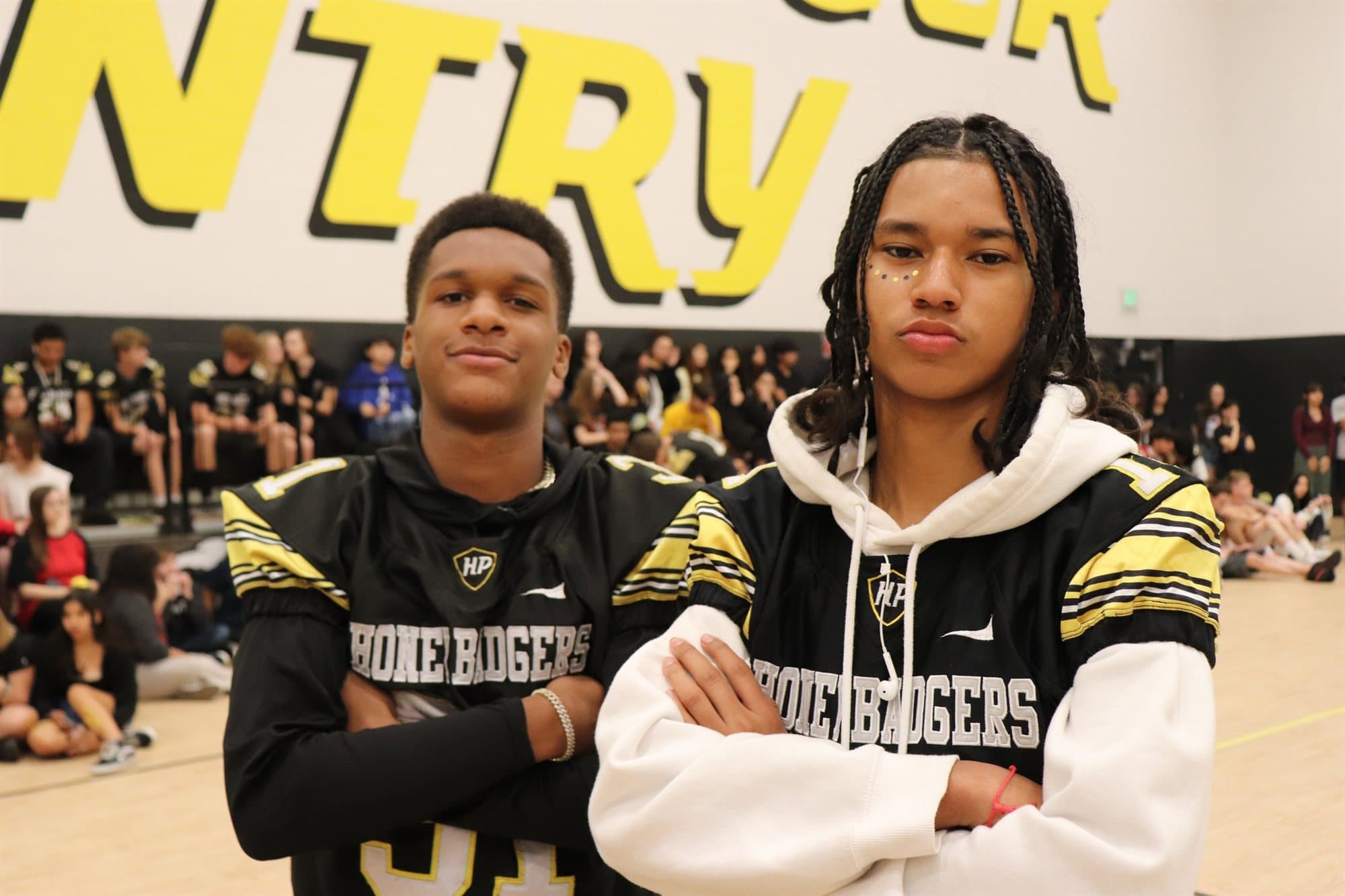 Two Highland Prep student-athletes at a pep assembly