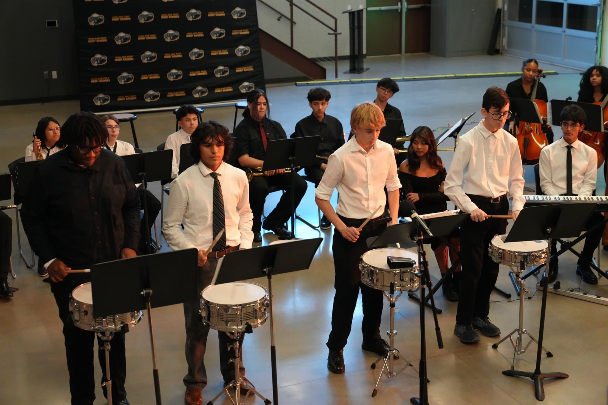 The Highland Prep drumline performing