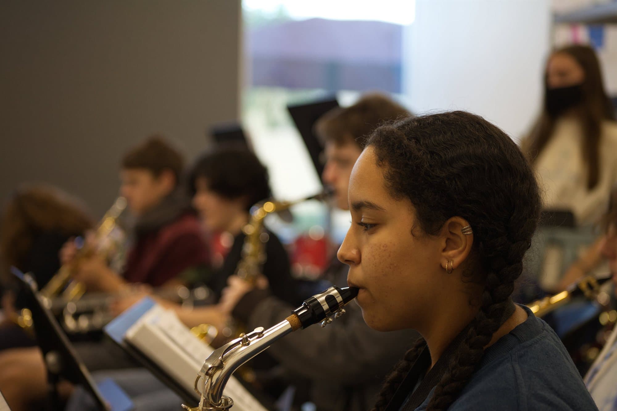 A Highland Prep student playing saxophone in the band