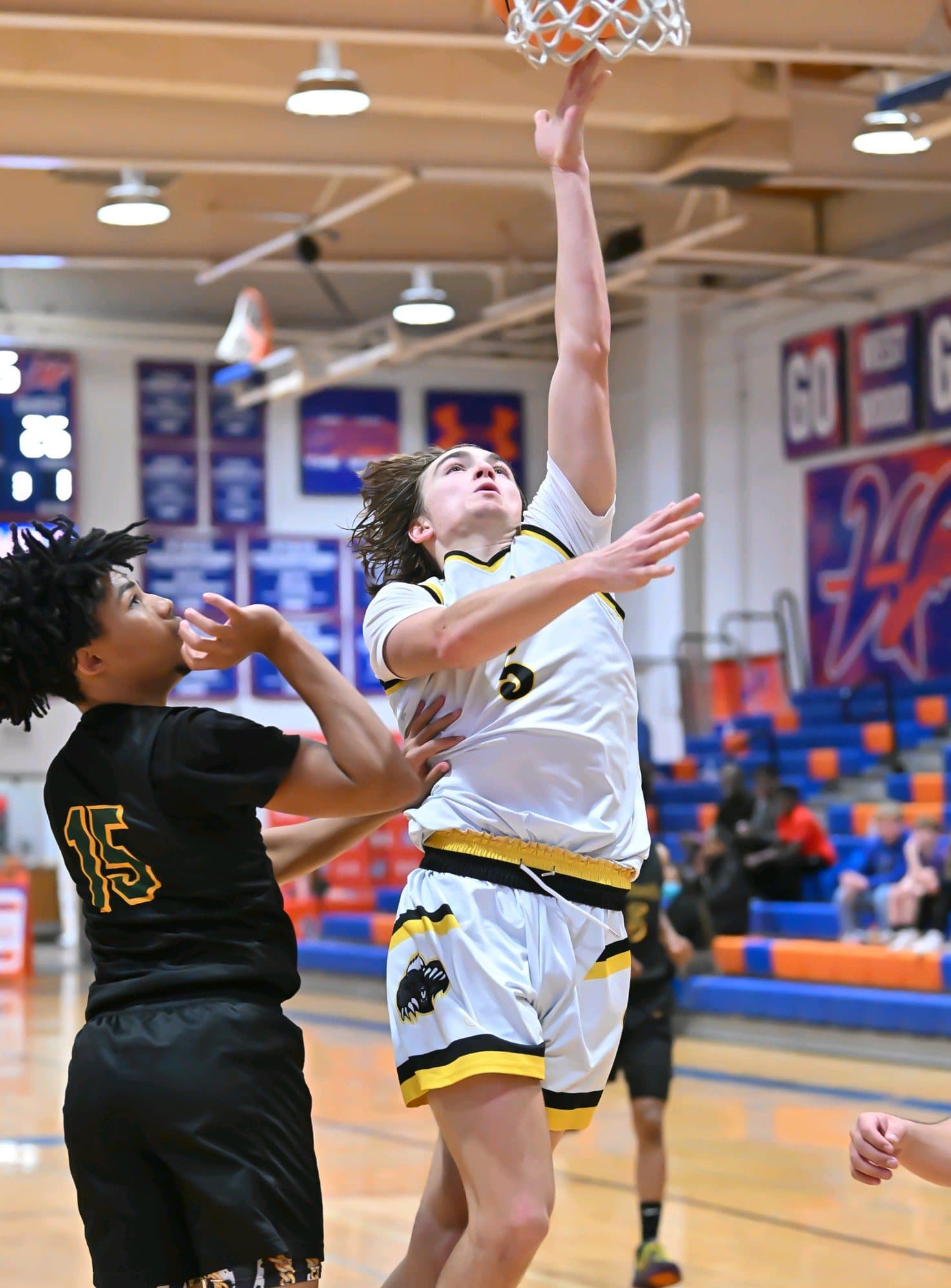 A Highland Prep player going up for a layup