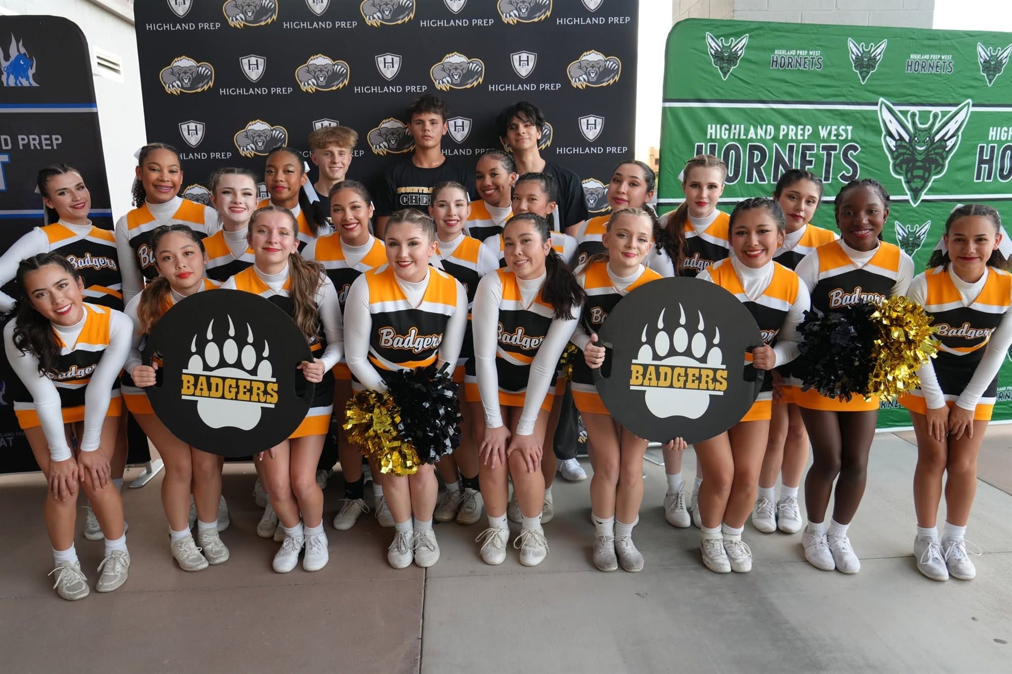 The Highland Prep cheer team with their pom-poms