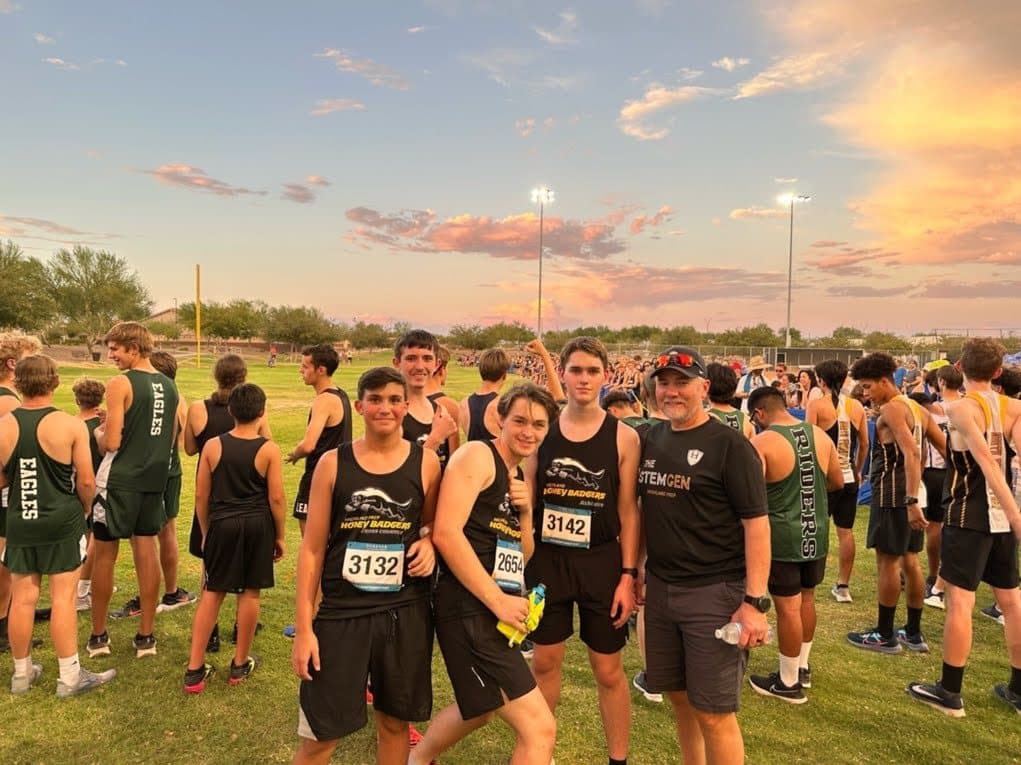 The Highland Prep cross country team at sunset