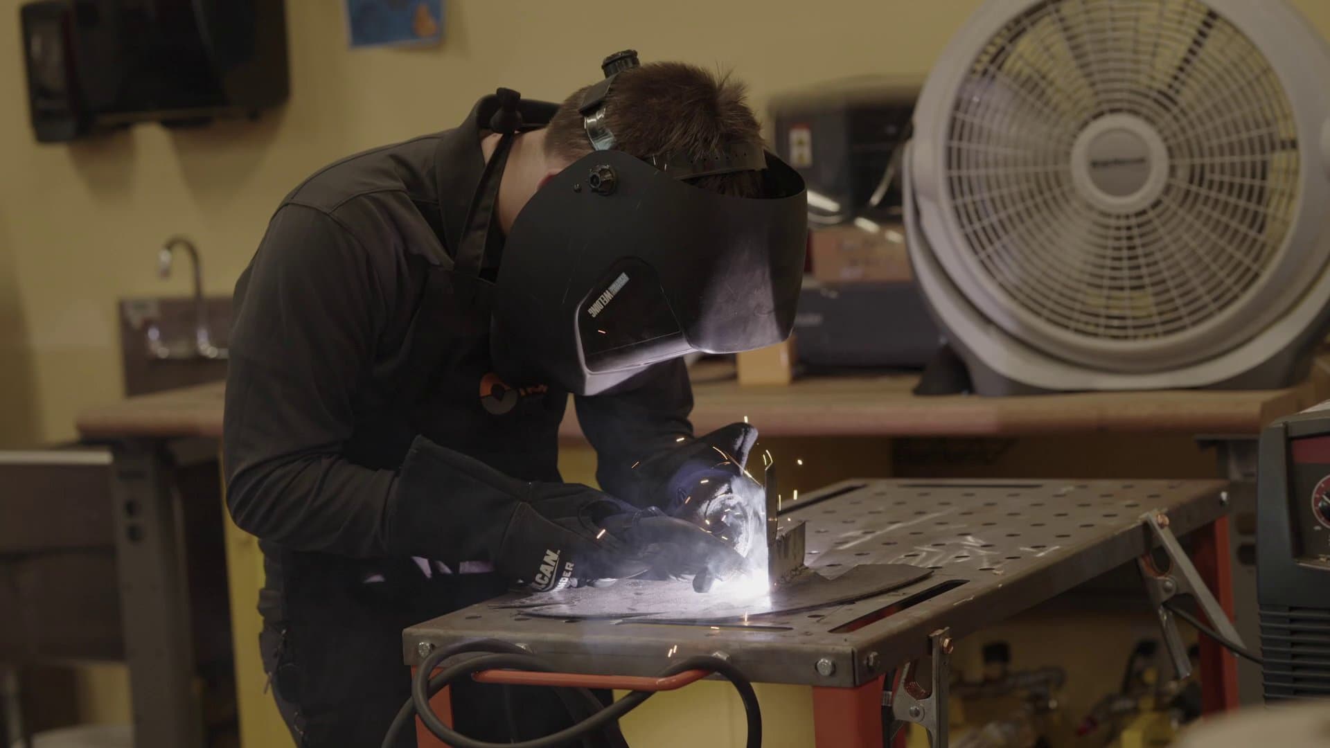 A Highland Prep student welding in the fabrication lab