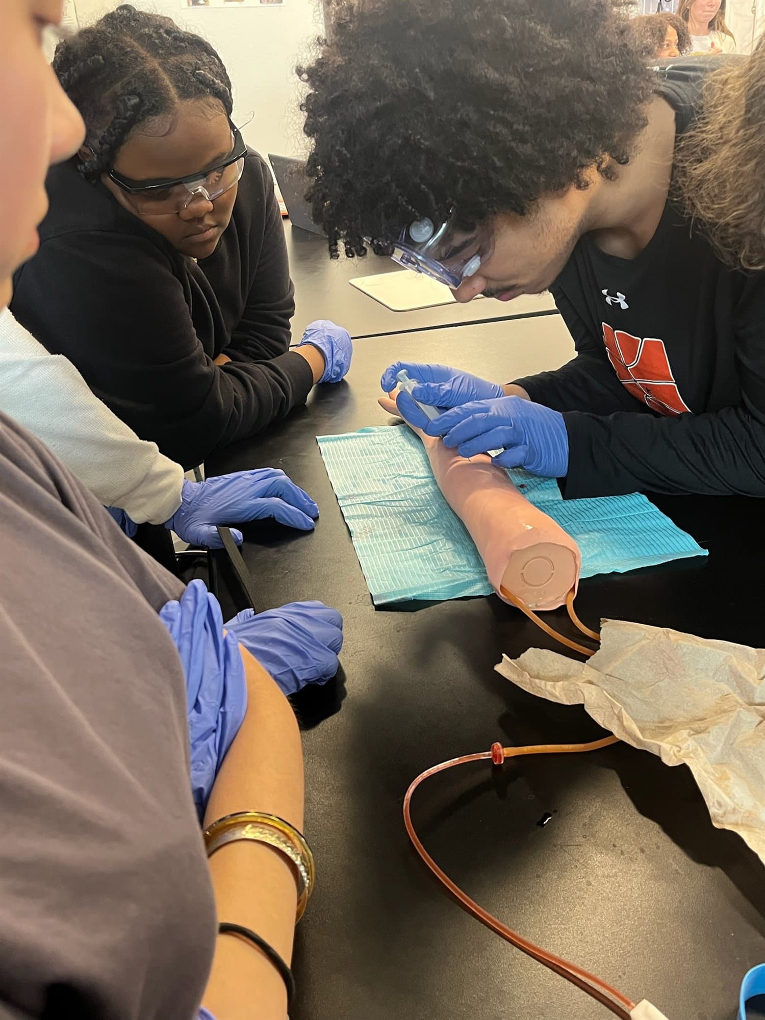 Highland Prep students examining evidence in forensic science
