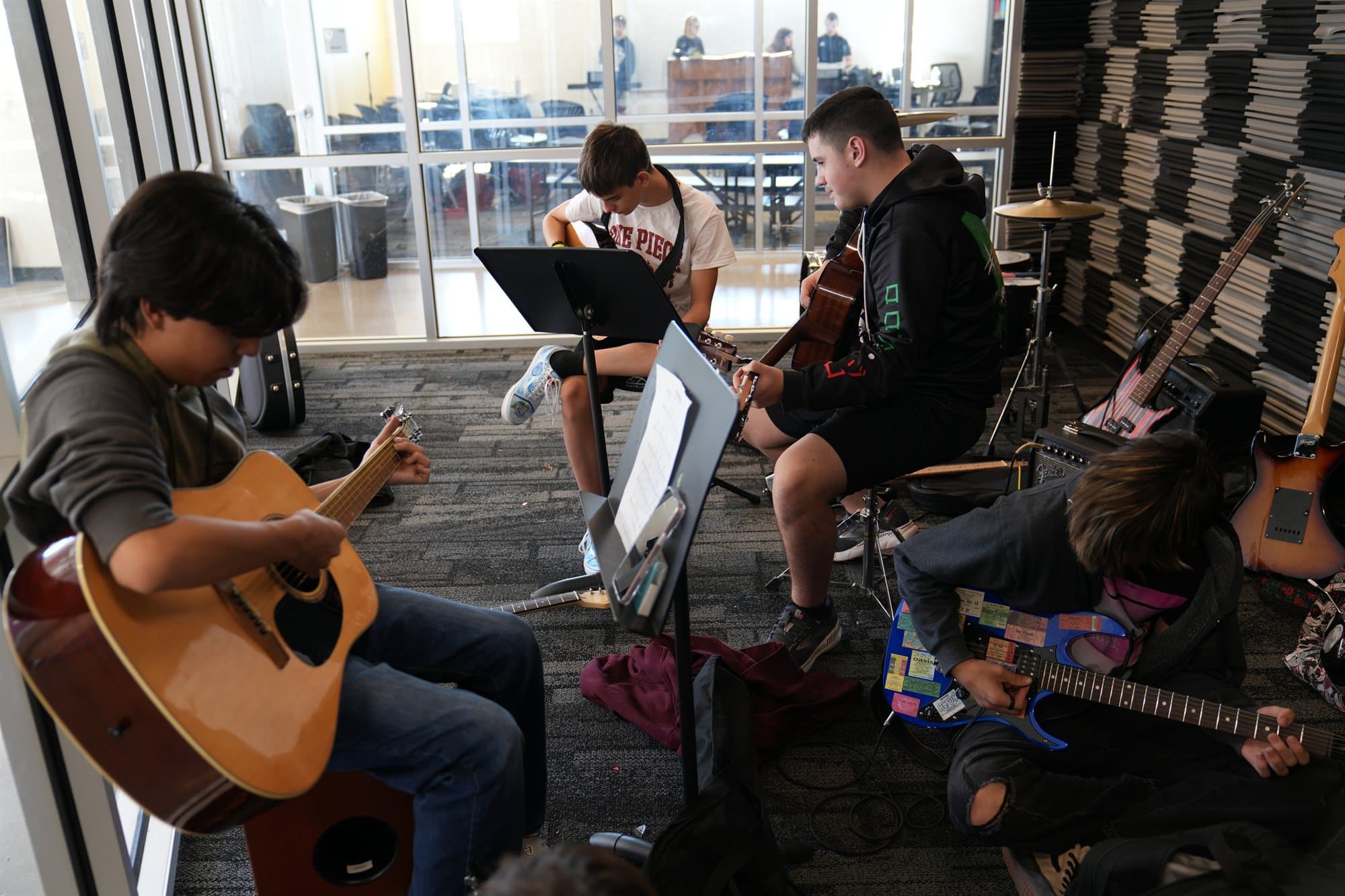 A Highland Prep student playing guitar