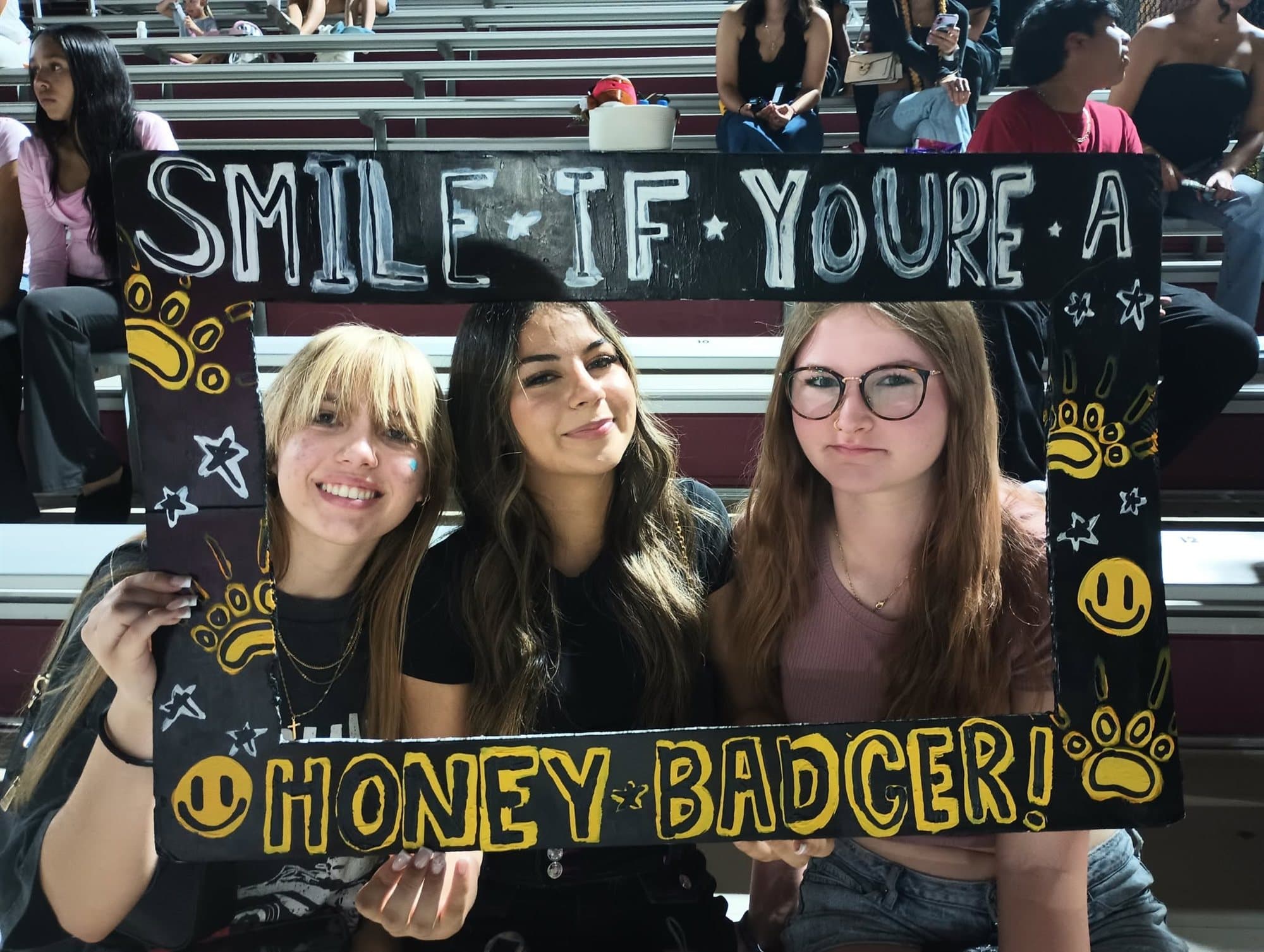Highland Prep students at a Honey Badger photo frame