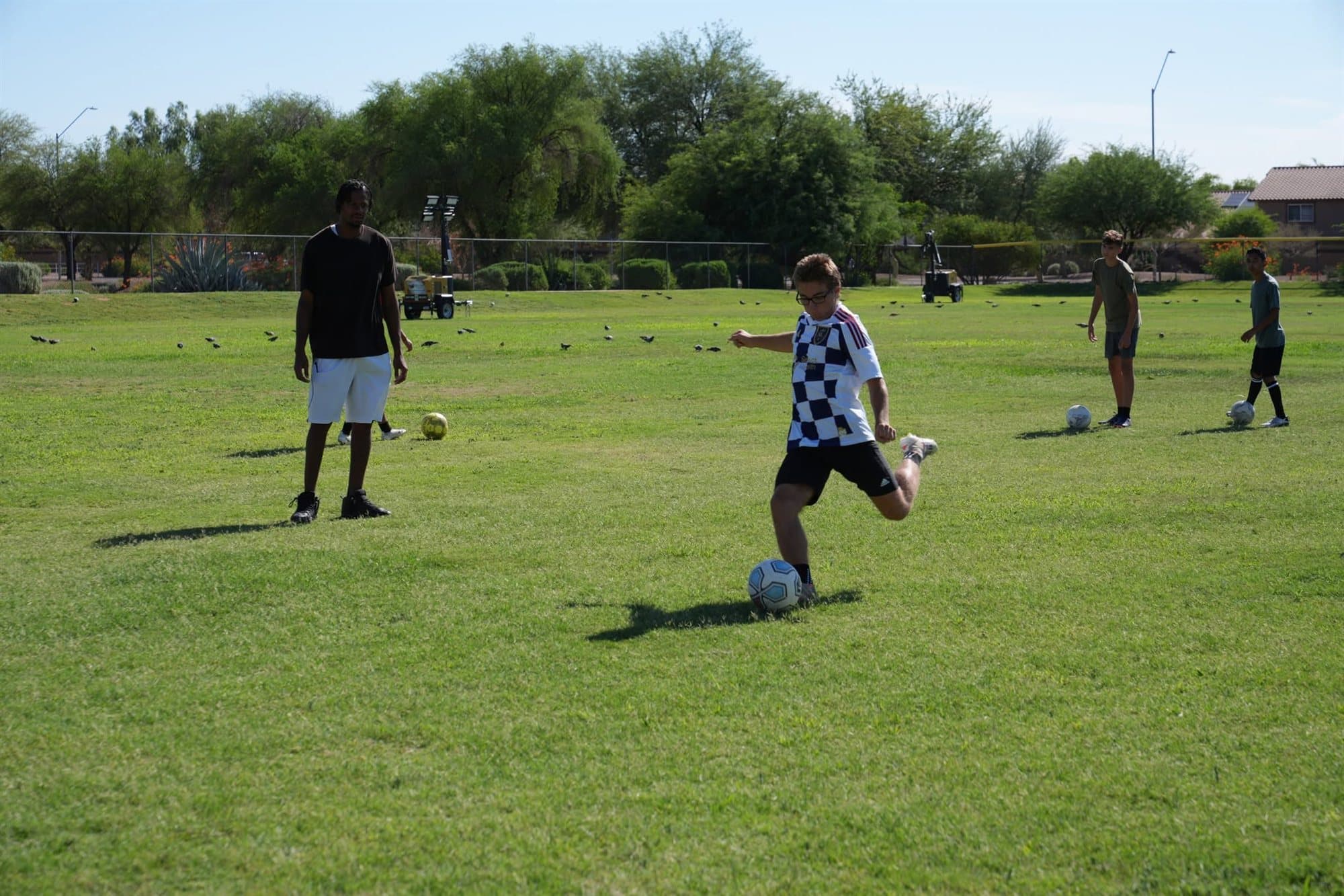 Highland Prep soccer players warming up on the field