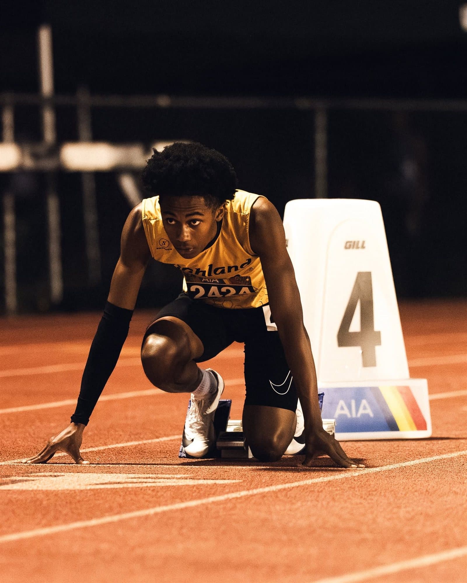 A Highland Prep sprinter set in the starting blocks