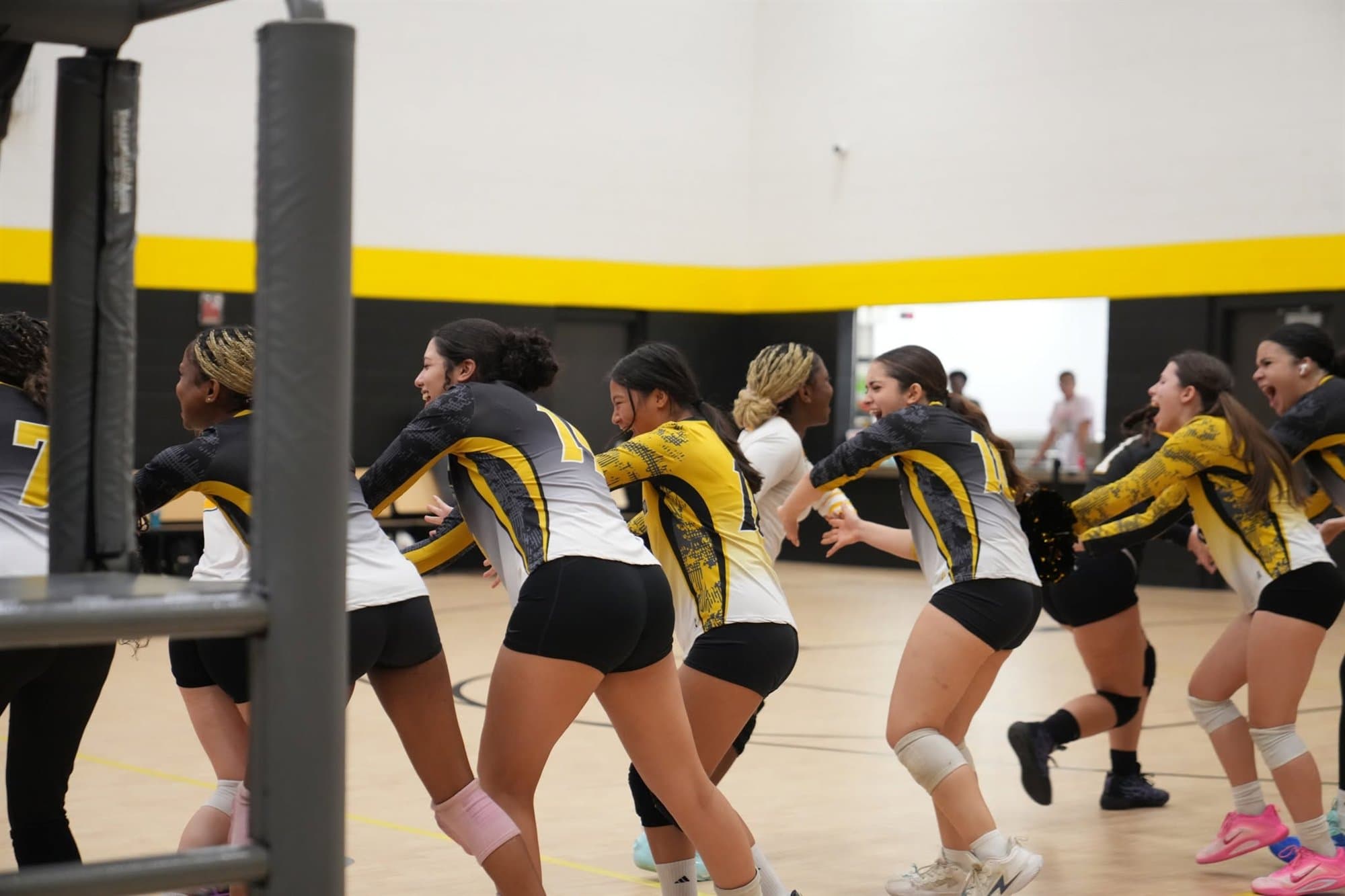 Highland Prep volleyball players celebrating a point