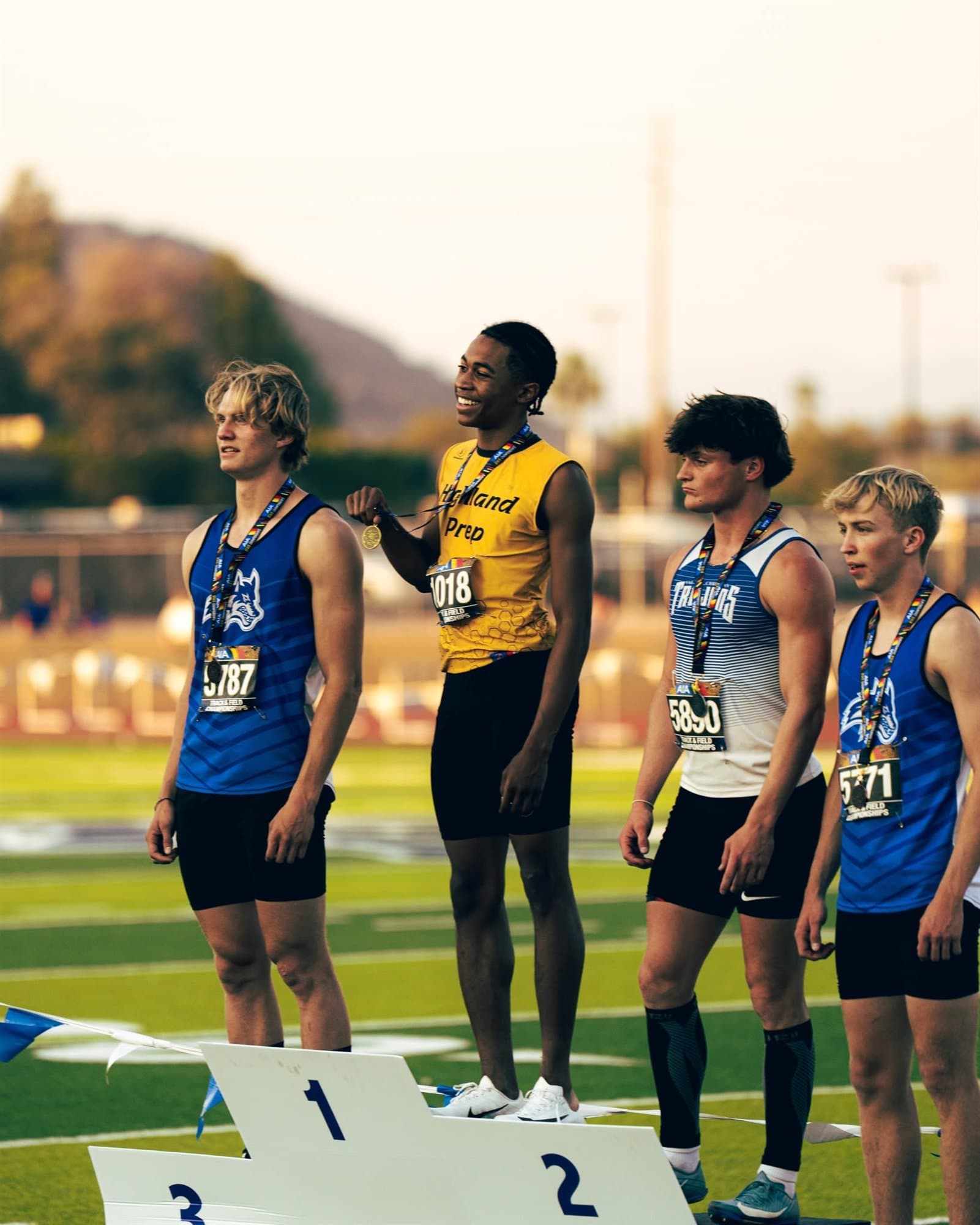 A Highland Prep athlete atop the podium at the state track championships