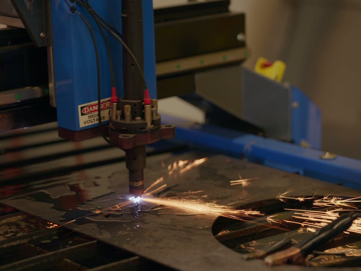 CNC plasma cutter in the Highland Prep fabrication shop