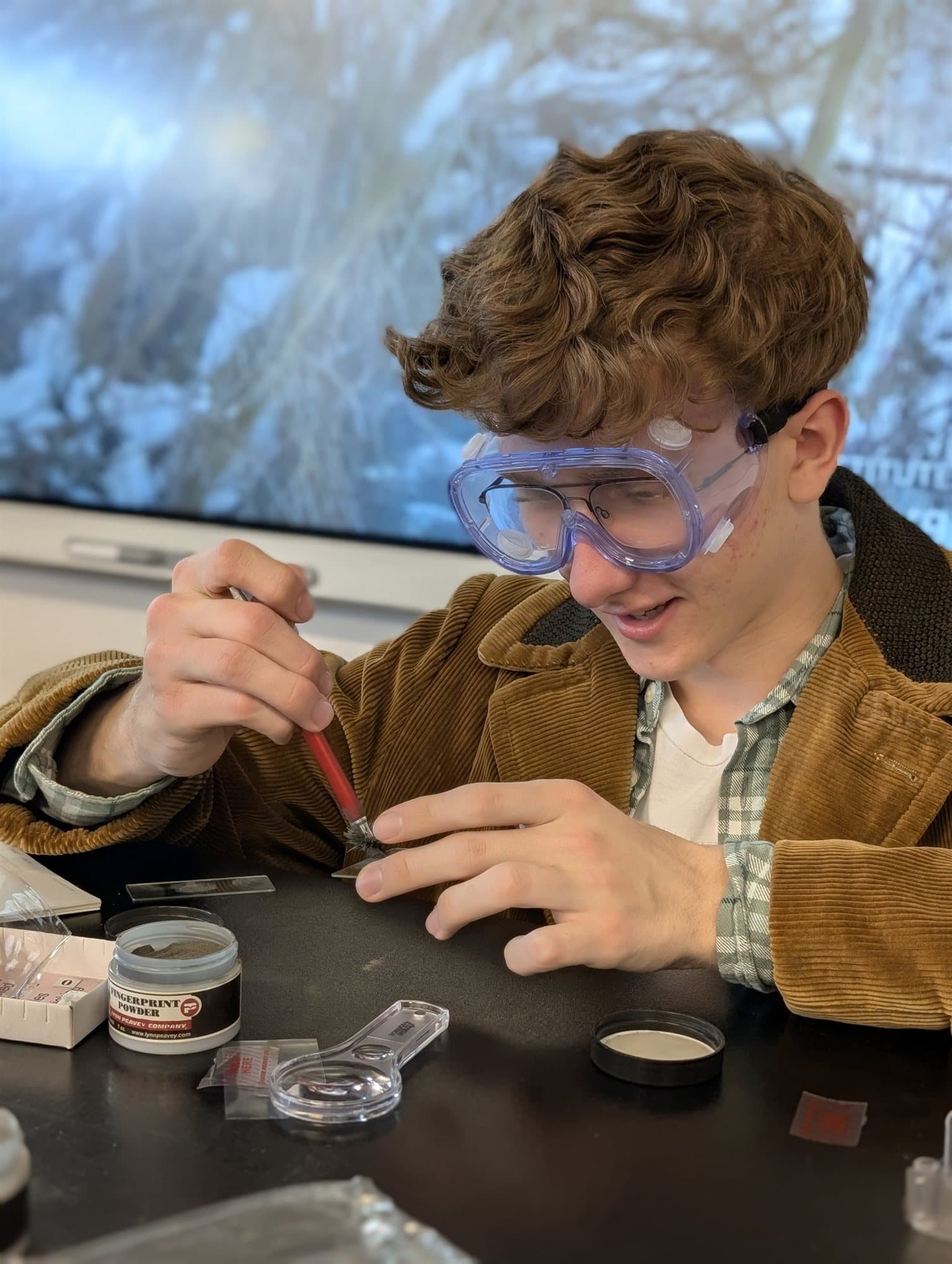 A Highland Prep freshman presenting a project at the science fair